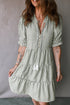 Striped Tassel Tie Neck Ruffled Tiered Mini Dress