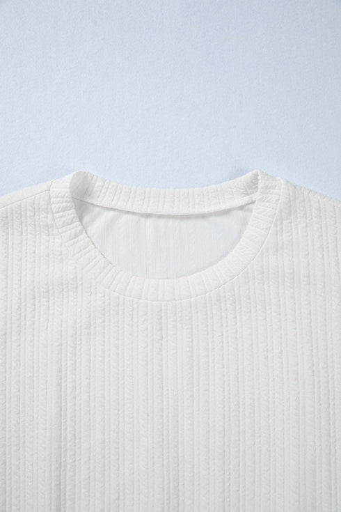 Textured Drop Shoulder Crew Neck Peplum Hem Top