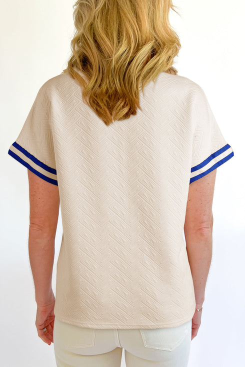 Textured Geometric Half Zip Short Sleeve Top