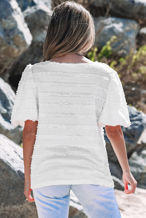 Textured Puff Sleeve Round Neck Blouse with Frayed Trim Accents