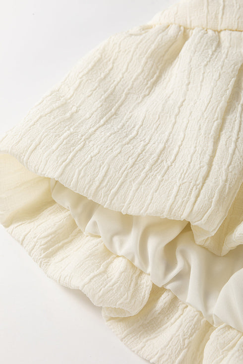 Textured Puff Sleeve Tie Front Bubble Hem Blouse
