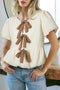 Textured Puff Sleeve Tie Front Bubble Hem Blouse