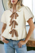 Textured Puff Sleeve Tie Front Bubble Hem Blouse