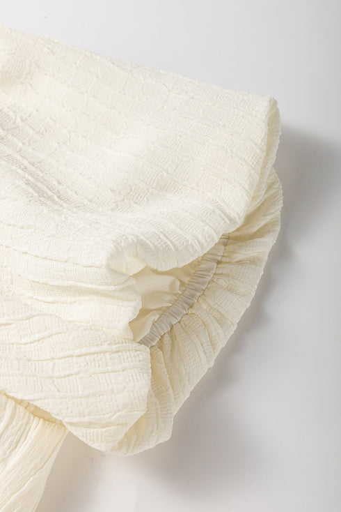 Textured Puff Sleeve Tie Front Bubble Hem Blouse
