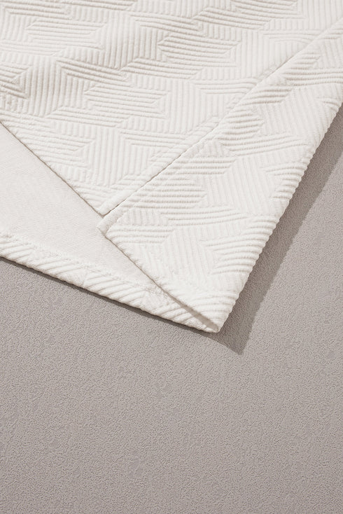 Textured Short Sleeve Collared V Neck Top