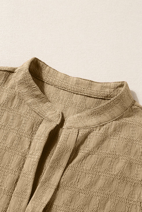 Textured Sleeveless Split Neck Pleated Front Blouse