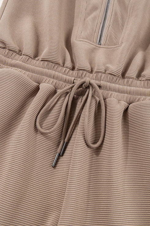 Textured Solid Short Sleeve Half Zip Drawstring Romper