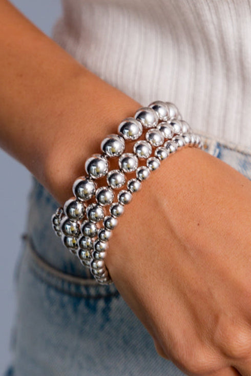 Three Piece Graduated Size Polished Alloy Bead Bracelet Set