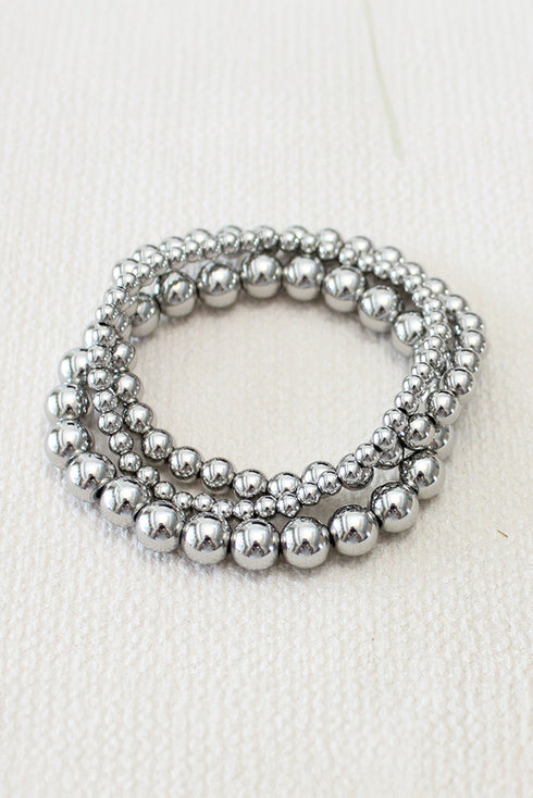 Three Piece Graduated Size Polished Alloy Bead Bracelet Set
