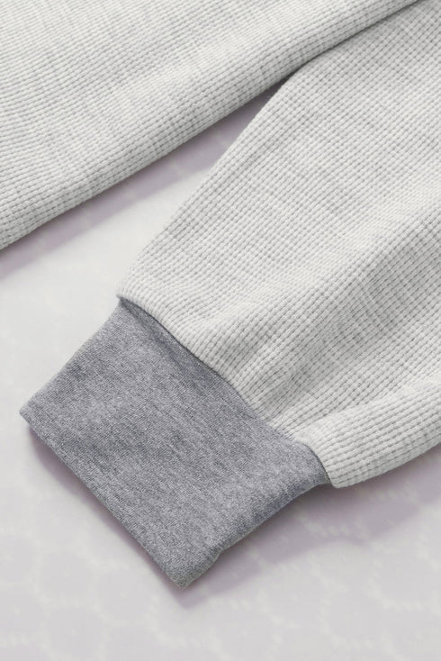 Waffle Knit V Neck Exposed Seam Relaxed Sweatshirt