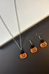 Whimsical Pumpkin Face Charm Necklace And Earring Set
