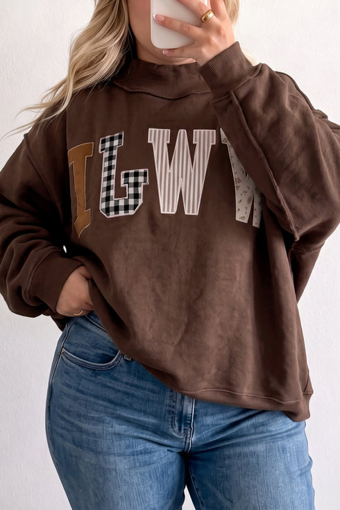 WWJD Mixed Pattern Exposed Seam Mock Neck Sweatshirt